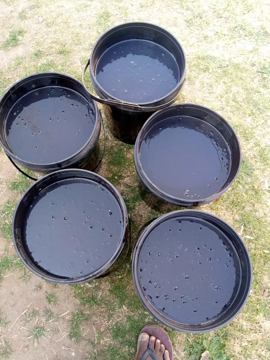 Modekai paint mixed in buckets