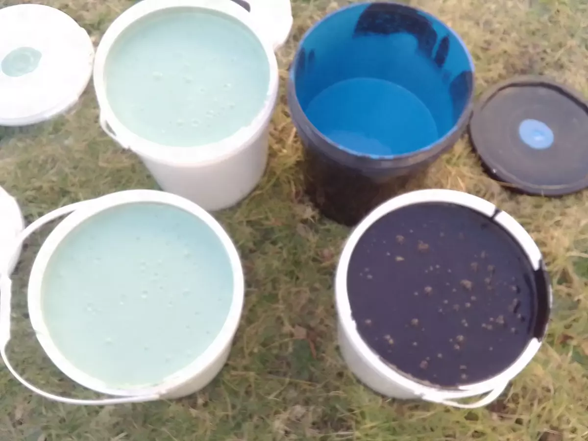 Modekai paint mixed in buckets