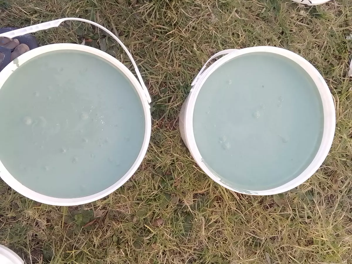Modekai paint mixed in buckets